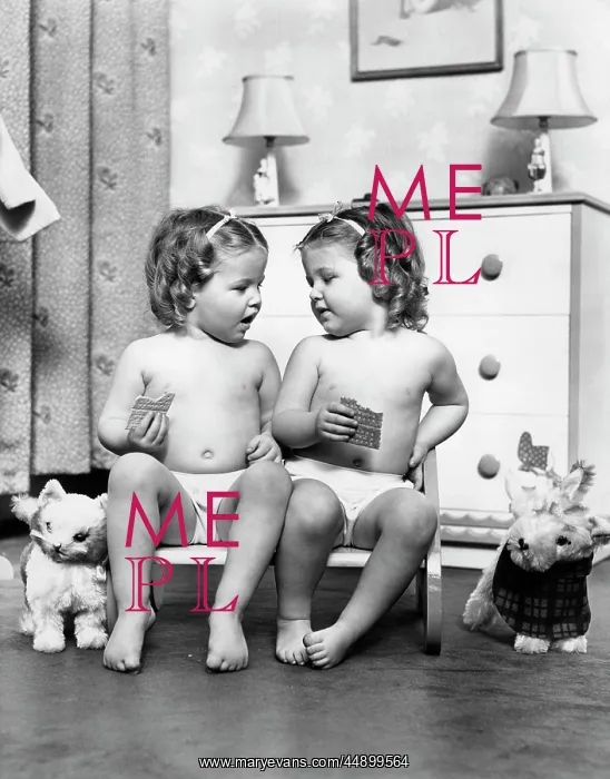 : 1950s Twin Girls Siting In A Double : 1950s Twin Girls Siting In A Double
