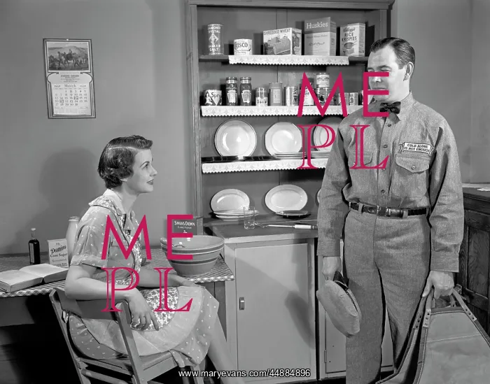: 1950s Woman Apron Sitting At Kitchen : 1950s Woman Apron Sitting At Kitchen