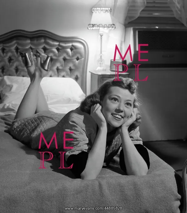  : 1950s Woman Lying On Bed Like