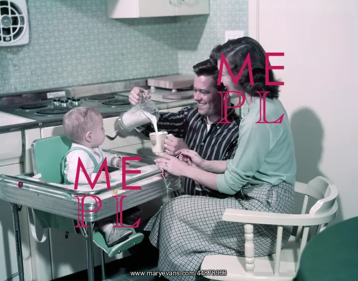 : 1950s Young Family In Kitchen : 1950s Young Family In Kitchen