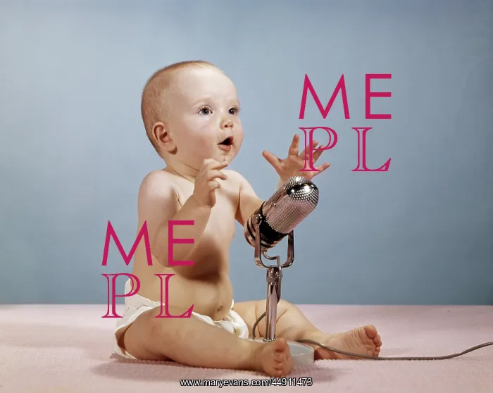 : 1960s baby talking singing into : 1960s baby talking singing into