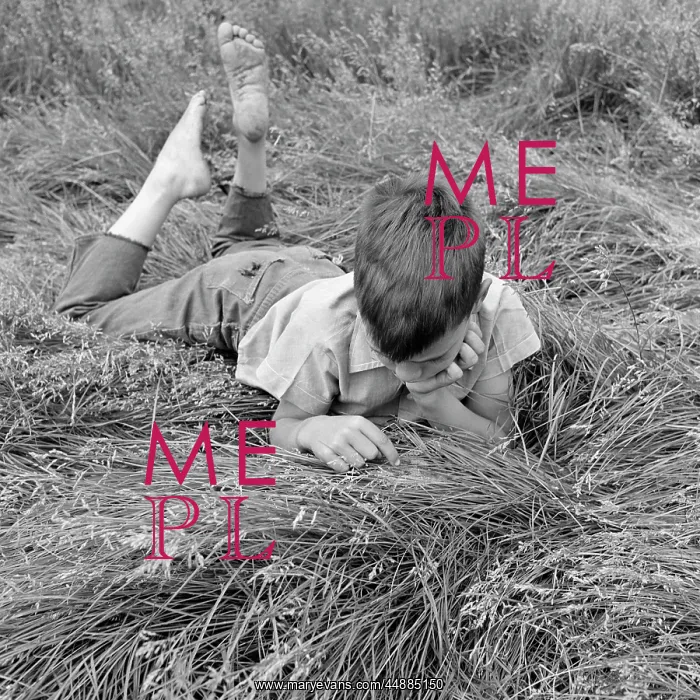  : 1960s Barefoot Boy Lying Stomach-Down