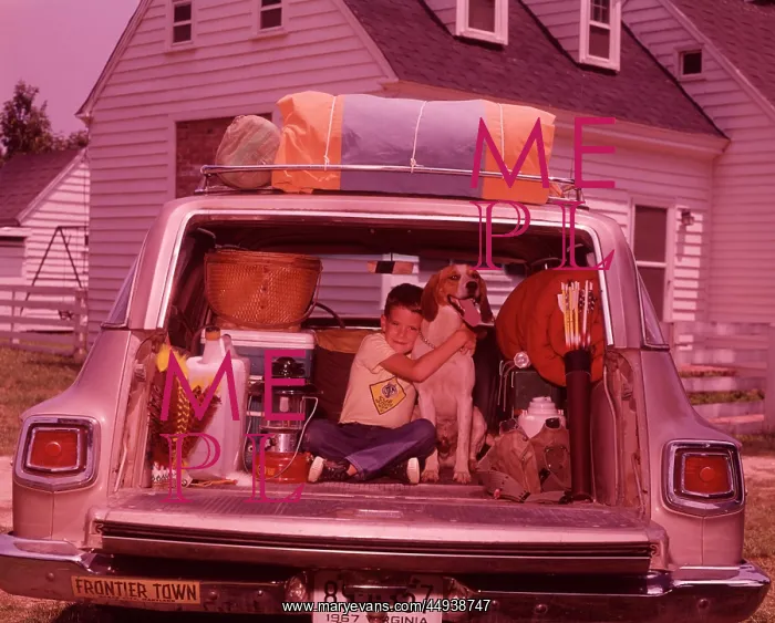  : 1960s Boy Hugging Dog Back Station