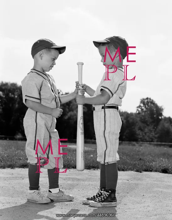 : 1960s Two Boys In Baseball Uniforms Choosing Sides By Gettin : 1960s Two Boys In Baseball Uniforms Choosing Sides By Gettin