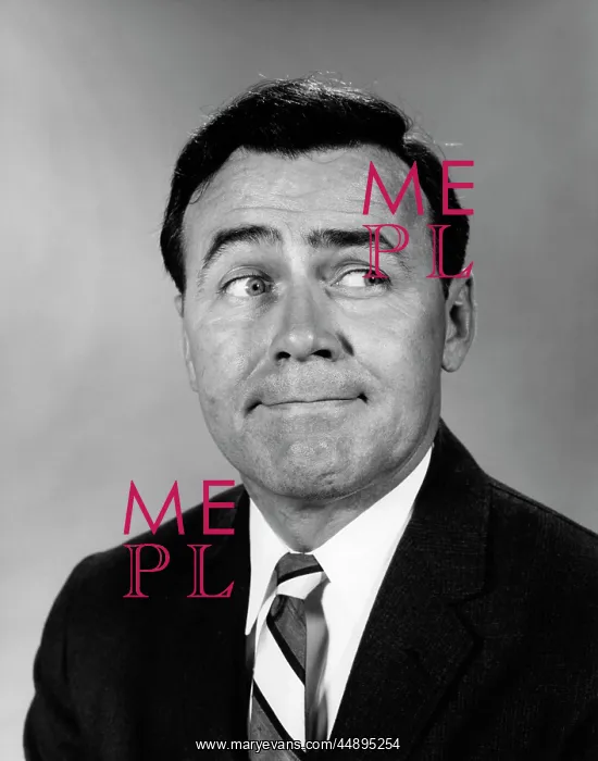  : 1960s BUSINESSMAN MAKING FUNNY FACE LOOKING TO