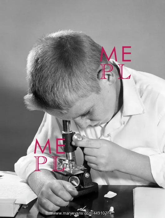 : 1960s - Close-Up of Boy Looking Down Through Microscope : 1960s - Close-Up of Boy Looking Down Through Microscope