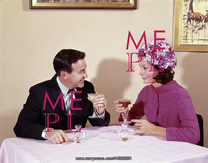  : 1960s COUPLE DRINKING COCKTAILS AT TABLE HUSBAND