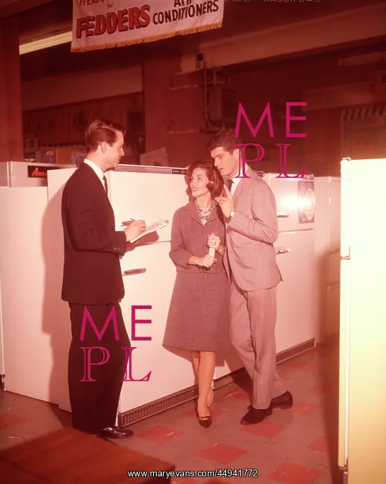 : 1960s Couple Talking To Salesman : 1960s Couple Talking To Salesman