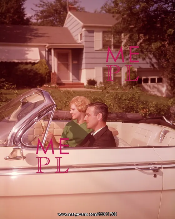  : 1960s Couple In White Convertible
