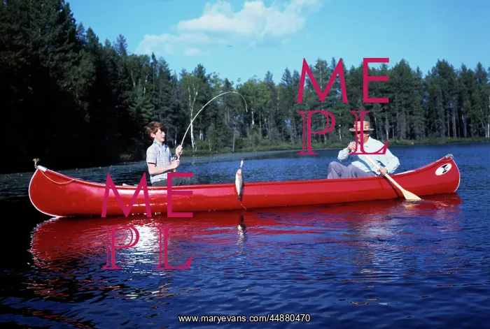 : 1960s Grandfather & Boy Red Canoe : 1960s Grandfather & Boy Red Canoe