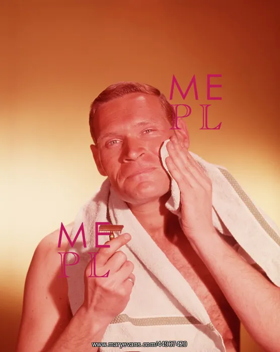  : 1960s Man Holding Razor Towel