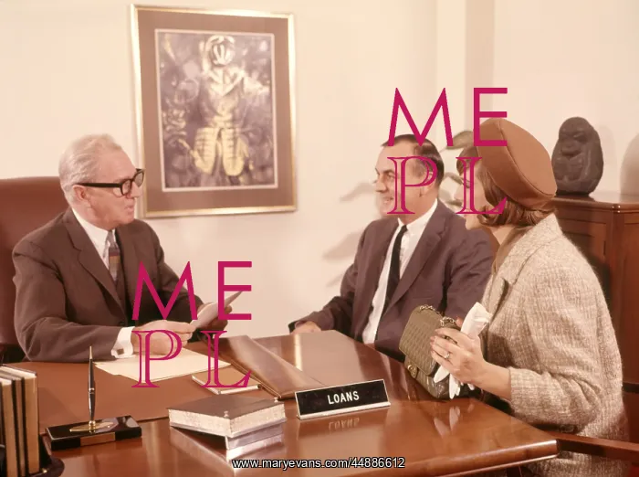 : 1960s Man Interviewing Couple : 1960s Man Interviewing Couple