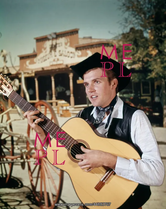  : 1960s Man Playing Acoustic Guitar