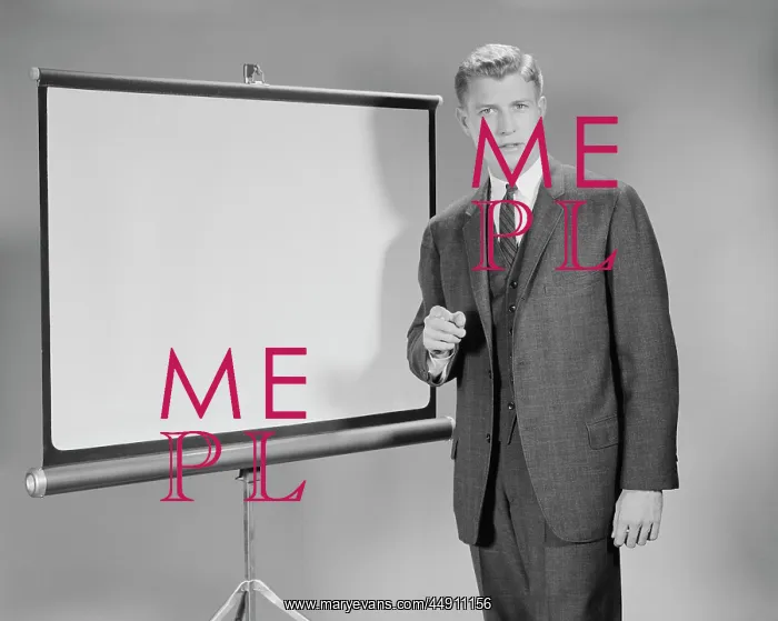 : 1960s MAN STANDING BESIDE BLANK SCREEN READY : 1960s MAN STANDING BESIDE BLANK SCREEN READY