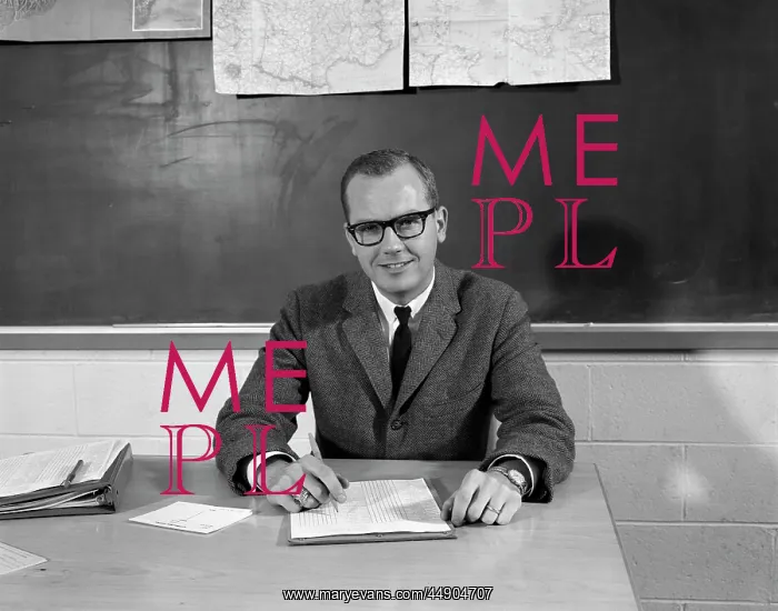 : 1960s Man Teacher At Desk In Classroom : 1960s Man Teacher At Desk In Classroom