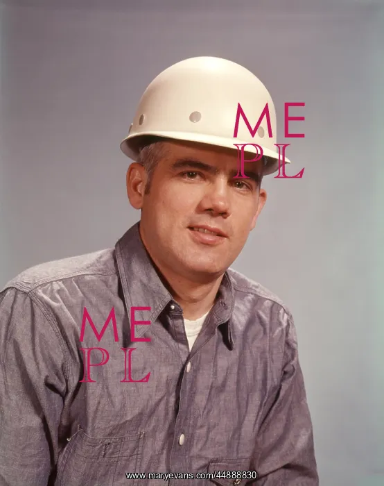 : 1960s Man Wearing Hard Hat Worker