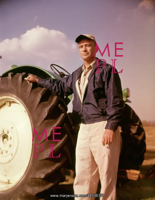 : 1960s Portrait of Serious Man Farmer Standing Beside Larg : 1960s Portrait of Serious Man Farmer Standing Beside Larg