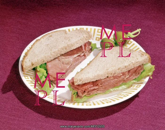 : 1960s roast beef sandwich on rye bread olives : 1960s roast beef sandwich on rye bread olives