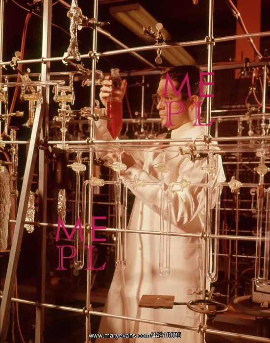 : 1960s Scientist Man Lab Technician Checking Measurement o : 1960s Scientist Man Lab Technician Checking Measurement o