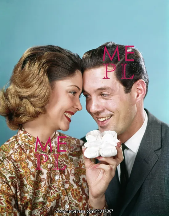 : 1960s Smiling Couple Touching Foreheads looking at each O : 1960s Smiling Couple Touching Foreheads looking at each O