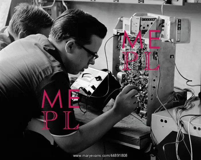  : 1960s Side View Of Students Working