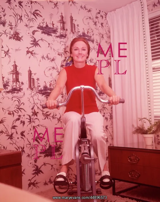  : 1960s Woman On Exercise Cycle