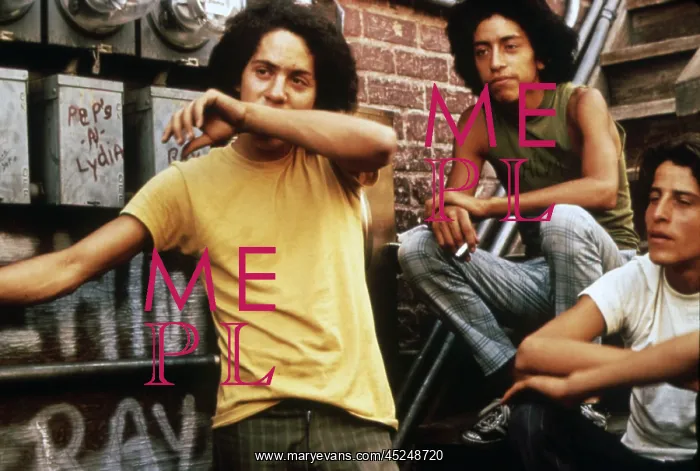: 1970s America. Three young chicano men in the : 1970s America. Three young chicano men in the
