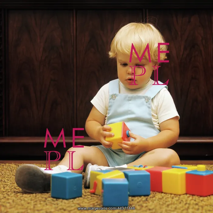 : 1970s blond boy toddler playing with : 1970s blond boy toddler playing with