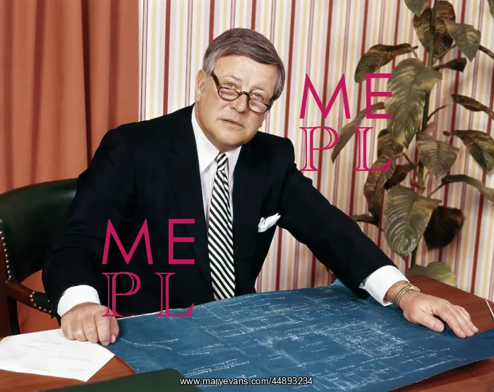  : 1970s Serious Businessman At Desk With Blueprints