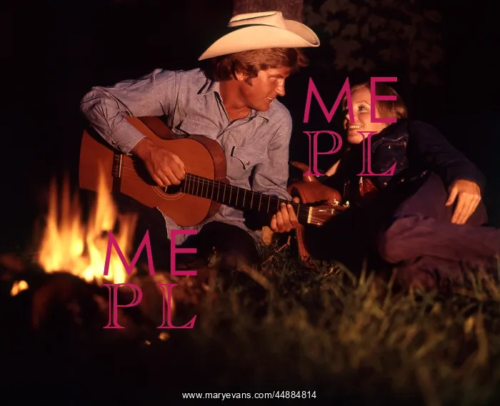 : 1970s Couple Campfire Night Man : 1970s Couple Campfire Night Man
