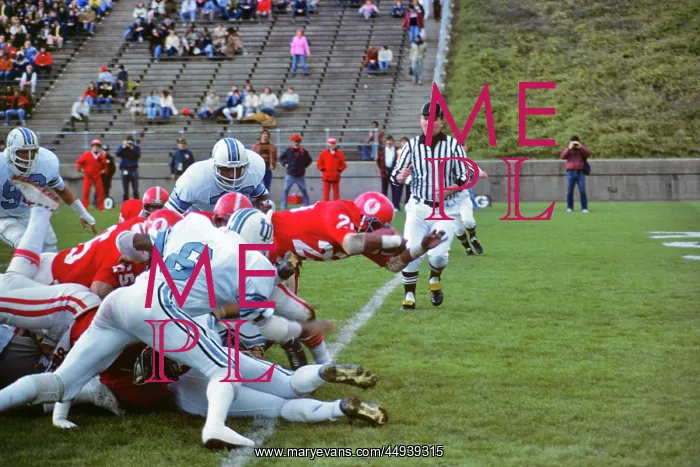 : 1970s Player Stretching over Goal Line for Touchdown Coll : 1970s Player Stretching over Goal Line for Touchdown Coll