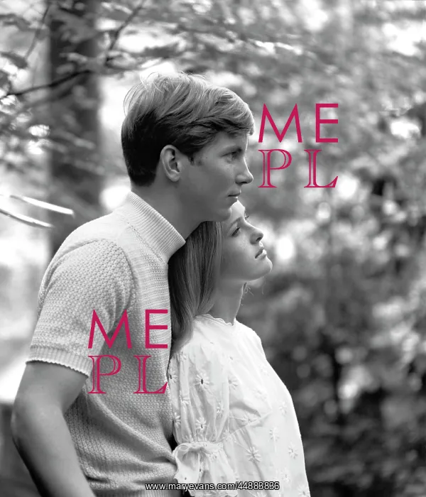 : 1970s Side View Of Couple Standing : 1970s Side View Of Couple Standing