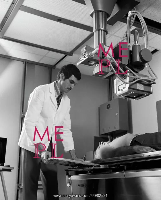 : 1970s X-Ray Technician X-Raying : 1970s X-Ray Technician X-Raying