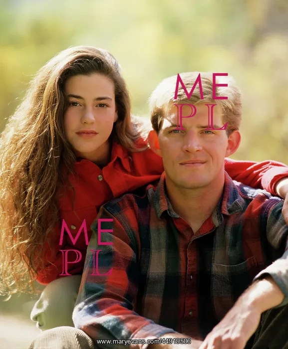 : 1990s Portrait of Serious Young Couple looking at Camera : 1990s Portrait of Serious Young Couple looking at Camera