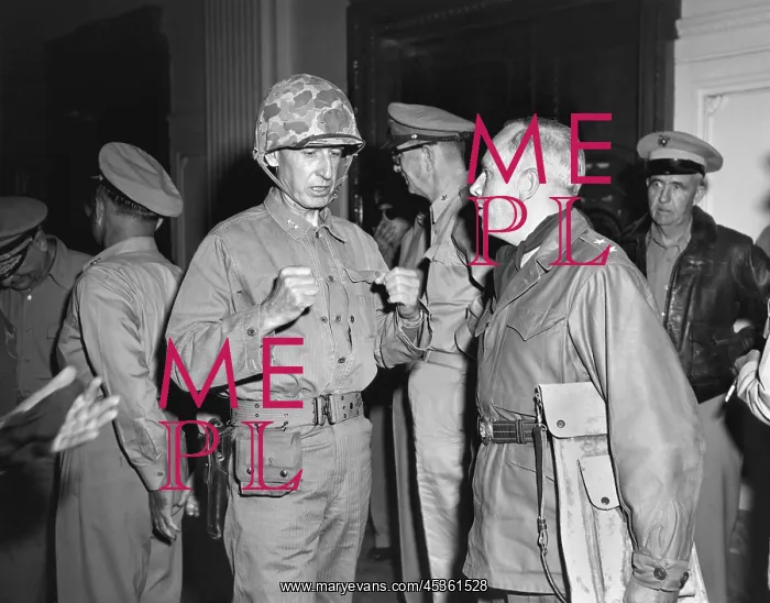 : 1st Marine Div. Gen. Oliver Smith, talks with Maj : 1st Marine Div. Gen. Oliver Smith, talks with Maj