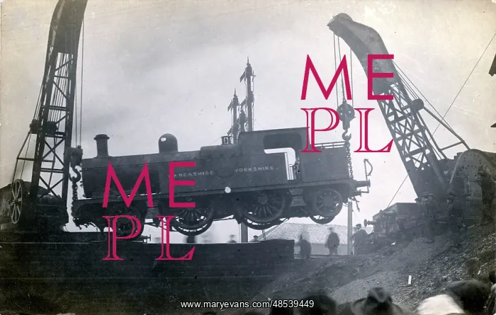 : 2-4-2 Tank Engine Suspended by Cranes, Rochdale, Lancashire : 2-4-2 Tank Engine Suspended by Cranes, Rochdale, Lancashire