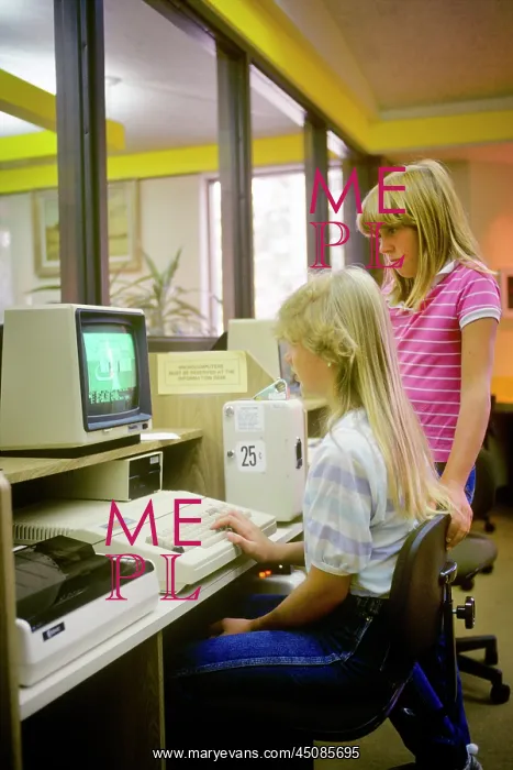  : 2 Girls Working on Computer in Public Library