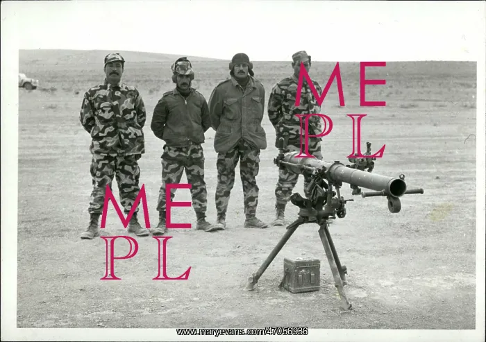 : 4 members of the P.L.O. ready to fire with the : 4 members of the P.L.O. ready to fire with the