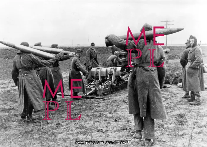 : A 8.8cm PAK 43 is positioned very close to the roadway : A 8.8cm PAK 43 is positioned very close to the roadway