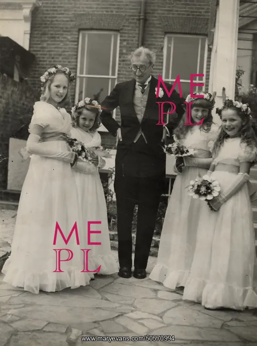 : A. P. Herbert with bridesmaids : A. P. Herbert with bridesmaids