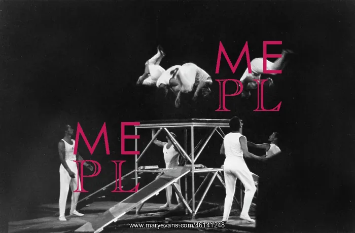 : Acrobats turn aerial summersaults : Acrobats turn aerial summersaults