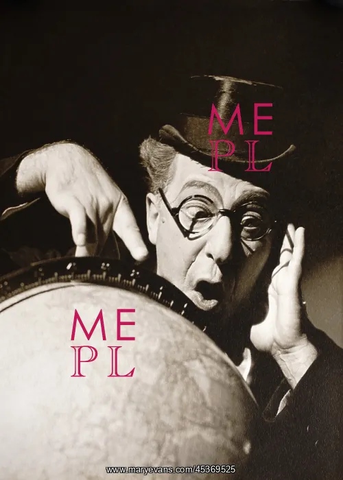 : Actor Ed Wynn poses behind a globe of earth : Actor Ed Wynn poses behind a globe of earth