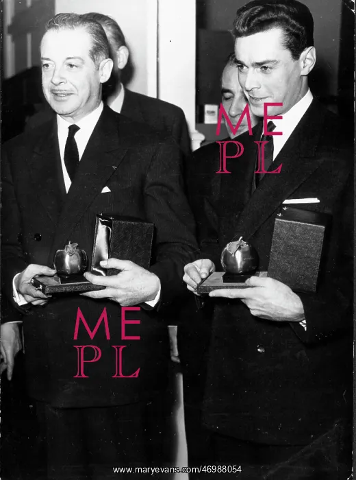 : Actor Fernand Gravey receiving an award : Actor Fernand Gravey receiving an award