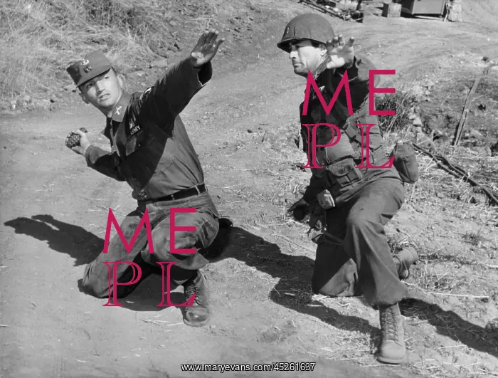 : Actor Gregory Peck (right) gets a lesson in hand : Actor Gregory Peck (right) gets a lesson in hand