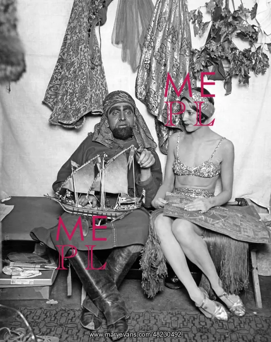 : Actors in costume with a model boat, 1927 : Actors in costume with a model boat, 1927