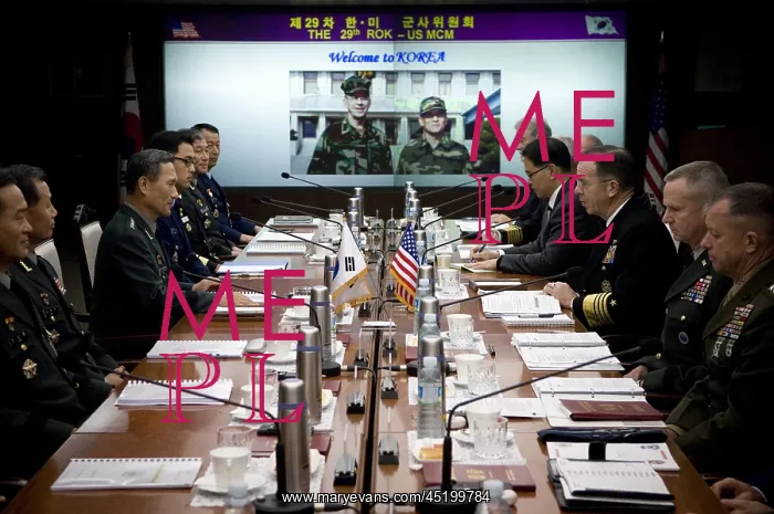 : US Admiral Mike Mullen center right sits ? : US Admiral Mike Mullen center right sits ?