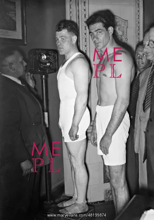 : Adolf Heuser and Norman Tomasulo weighing in, 1936 : Adolf Heuser and Norman Tomasulo weighing in, 1936