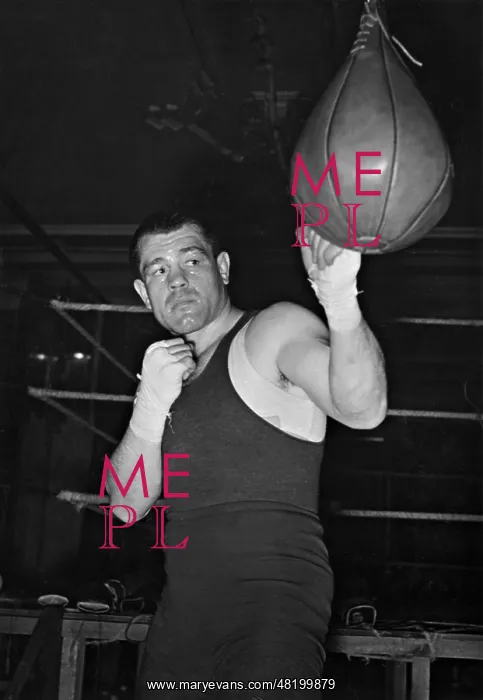 : Adolf Heuser training at a punching bag, 1937 : Adolf Heuser training at a punching bag, 1937