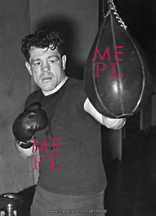 : Adolf Heuser training at the punching bag, 1941 : Adolf Heuser training at the punching bag, 1941