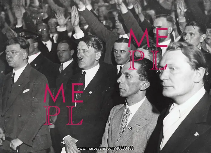 : Adolf Hitler (3rd from right) in civil at a rally : Adolf Hitler (3rd from right) in civil at a rally